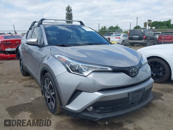 2019 Toyota C-HR XLE with VIN JTNKHMBX3K1016723, listed as a IAAI auction lot 42040571 with 158,804 mi miles. Bid and sale history available at carsss.com. Image 1.