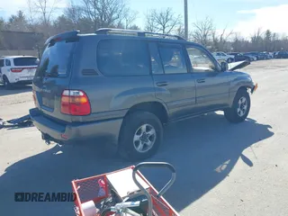 1999 Toyota Land Cruiser with VIN JT3HT05J5X0045784, listed as a IAAI auction lot 41886919 with 505,121 mi miles. Bid and sale history available at carsss.com. Image 4.