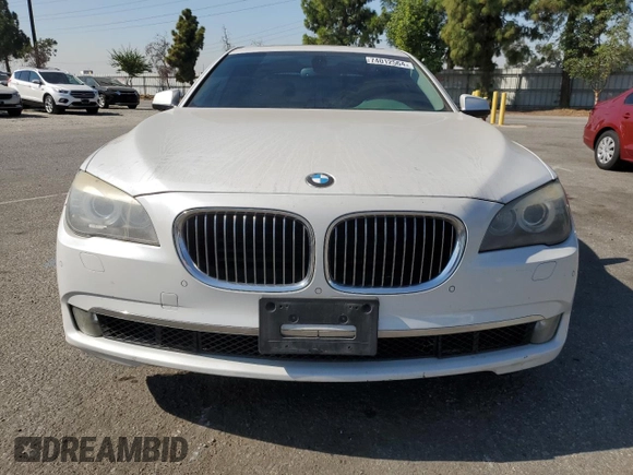 2012 BMW 7 Series 740Li with VIN WBAKB4C55CC575826, listed as a Copart auction lot 74012564 with 140,577 mi miles and Salvage Title. Bid and sale history available at carsss.com. Image 5.