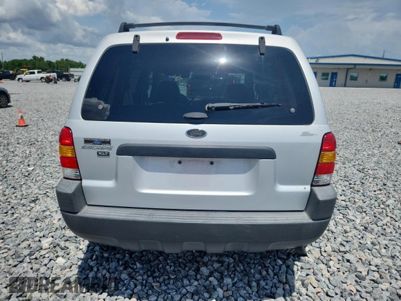 2003 Ford Escape XLT Popular with VIN 1FMYU03103KA06199, listed as a Copart auction lot 58731515 with 181,429 mi miles and Salvage title. Bid and sale history available at DreamBid. Image 6.