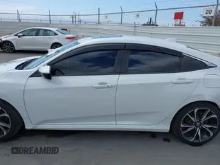 2019 Honda Civic Si z VIN 2HGFC1E58KH707715, wystawiony jako IAAI lot #42108131 z przebiegiem 126 044 mil mil oraz . Historia ofert i sprzedaży dostępna na DreamBid. Obrazek 15.