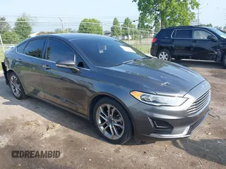2020 Ford Fusion SEL z VIN 3FA6P0CD9LR229470, wystawiony jako IAAI lot #42518855 z przebiegiem 67 088 mil mil oraz . Historia ofert i sprzedaży dostępna na DreamBid. Obrazek 1.