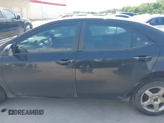 2015 Toyota Corolla L with VIN 5YFBURHE7FP255910, listed as a IAAI auction lot 42132289 with 97,635 mi miles and . Bid and sale history available at DreamBid. Image 14.