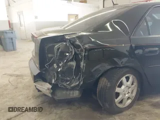 2007 Cadillac CTS z VIN 1G6DP577870128609, wystawiony jako IAAI lot #41723997 z przebiegiem 161 021 mil mil oraz . Historia ofert i sprzedaży dostępna na DreamBid. Obrazek 6.