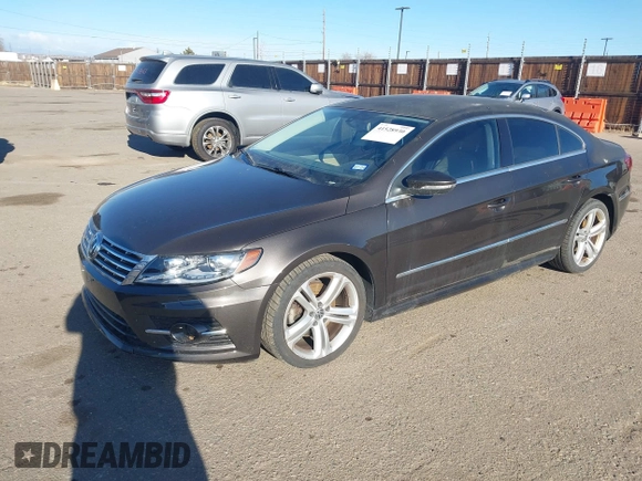 2014 Volkswagen CC Sport with VIN WVWBP7AN7EE514221, listed as a IAAI auction lot 41528930 with 140,227 mi miles and . Bid and sale history available at DreamBid. Image 2.