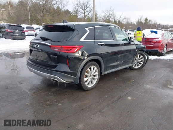 2019 Infiniti QX50 Essential with VIN 3PCAJ5M39KF112321, listed as a IAAI auction lot 41625297 with 82,032 mi miles and . Bid and sale history available at DreamBid. Image 4.