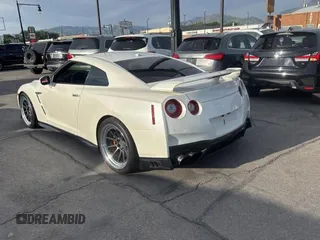 2020 Nissan GT-R Premium z VIN JN1AR5EF7LM100066, wystawiony jako Copart lot #58606645 z przebiegiem 35 824 mil mil oraz Szkody całkowita. Historia ofert i sprzedaży dostępna na DreamBid. Obrazek 3.