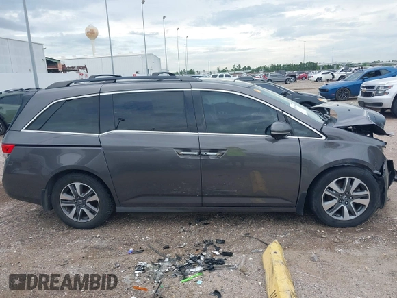 2015 Honda Odyssey Touring Elite with VIN 5FNRL5H99FB089642, listed as a IAAI auction lot 42591786 with 100,755 mi miles and . Bid and sale history available at DreamBid. Image 14.