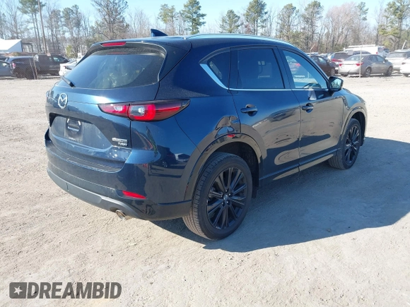 2022 Mazda CX-5 2.5 Turbo with VIN JM3KFBAY4N0534690, listed as a IAAI auction lot 41716988 with 23,910 mi miles and . Bid and sale history available at carsss.com. Image 4.