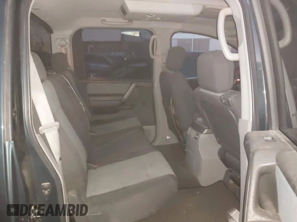 2004 Nissan Titan LE with VIN 1N6AA07B84N511373, listed as a IAAI auction lot 41200457 with 172,783 mi miles and . Bid and sale history available at DreamBid. Image 8.