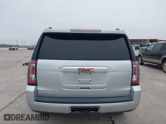 2015 GMC Yukon SLT with VIN 1GKS1BKC3FR253184, listed as a IAAI auction lot 41574610 with 152,543 mi miles. Bid and sale history available at carsss.com. Image 16.