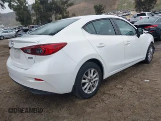 2015 Mazda 3 i Touring with VIN 3MZBM1V70FM231234, listed as a IAAI auction lot 42007526 with 114,255 mi miles. Bid and sale history available at carsss.com. Image 4.