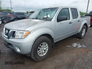 2017 Nissan Frontier SV with VIN 1N6AD0EV2HN750721, listed as a IAAI auction lot 42102310 with 79,205 mi miles and . Bid and sale history available at DreamBid. Image 2.