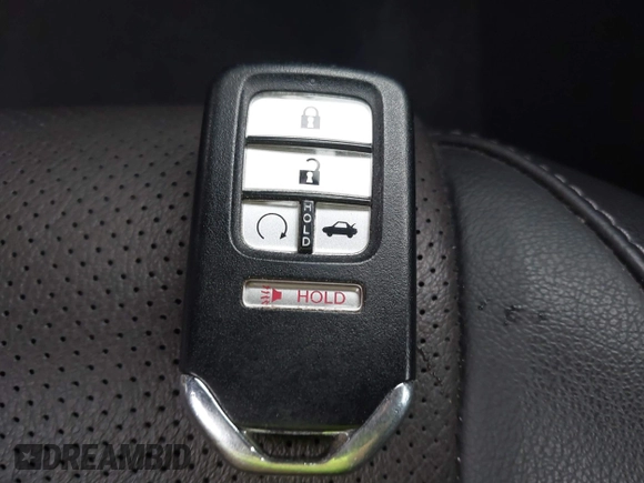 2020 Honda Insight Touring with VIN 19XZE4F98LE011149, listed as a IAAI auction lot 41834043 with 54,251 mi miles and . Bid and sale history available at carsss.com. Image 11.