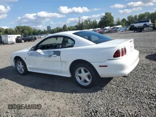 1997 Ford Mustang with VIN 1FALP4042VF119326, listed as a Copart auction lot 69286674 with 120,842 mi miles and Salvage Title. Bid and sale history available at carsss.com. Image 2.