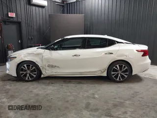2018 Nissan Maxima SV with VIN 1N4AA6AP7JC406251, listed as a IAAI auction lot 41786523 with 117,403 mi miles and . Bid and sale history available at DreamBid. Image 13.