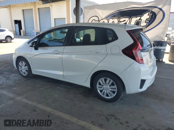 2016 Honda Fit LX with VIN JHMGK5H58GX031938, listed as a Copart auction lot 63101705 with 102,138 mi miles and Salvage title. Bid and sale history available at DreamBid. Image 2.