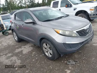 2012 Kia Sportage LX z VIN KNDPB3A22C7262656, wystawiony jako IAAI lot #42301331 z przebiegiem 180 743 mil mil oraz . Historia ofert i sprzedaży dostępna na DreamBid. Obrazek 1.