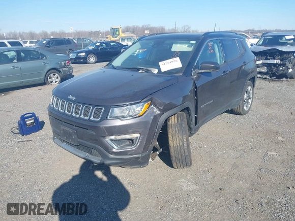 2021 Jeep Compass Limited with VIN 3C4NJDCB0MT583329, listed as a IAAI auction lot 41701976 with 57,815 mi miles and . Bid and sale history available at carsss.com. Image 19.