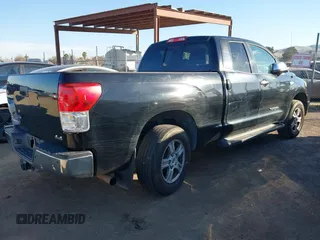 2011 Toyota Tundra 4WD Truck LTD with VIN 5TFBY5F15BX175854, listed as a IAAI auction lot 41425357 with 367,661 mi miles. Bid and sale history available at carsss.com. Image 4.