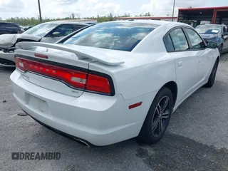 2014 Dodge Charger SXT z VIN 2C3CDXJG8EH339862, wystawiony jako IAAI lot #42373763 z przebiegiem 171 009 mil mil oraz . Historia ofert i sprzedaży dostępna na DreamBid. Obrazek 4.