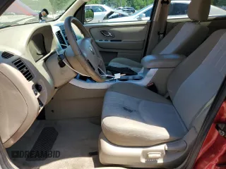 2006 Mercury Mariner Hybrid z VIN 4M2CU98H26KJ20650, wystawiony jako Copart lot #57728915 z przebiegiem 178 130 mil mil oraz Szkoda całkowita • Salvage title. Historia ofert i sprzedaży dostępna na DreamBid. Obrazek 7.