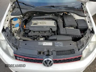 2010 Volkswagen GTI z VIN WVWGV7AJ1AW244061, wystawiony jako Copart lot #86822414 z przebiegiem 148 348 mil mil oraz Szkoda całkowita • Salvage title. Historia ofert i sprzedaży dostępna na DreamBid. Obrazek 11.
