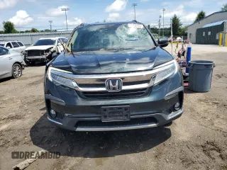 2020 Honda Pilot Touring 8-Passenger with VIN 5FNYF6H99LB053227, listed as a Copart auction lot 61302225 with 118,156 mi miles and Salvage title. Bid and sale history available at DreamBid. Image 5.