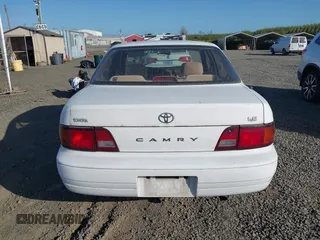1995 Toyota Camry LE z VIN JT2SK12E5S0332027, wystawiony jako IAAI lot #42078977 z przebiegiem 128 929 mil mil oraz . Historia ofert i sprzedaży dostępna na DreamBid. Obrazek 17.