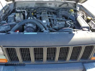 2000 Jeep Cherokee SE with VIN 1J4FF27SXYL140055, listed as a Copart auction lot 70315454 with 176,017 mi miles and Salvage title. Bid and sale history available at DreamBid. Image 12.