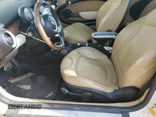 2009 MINI Hardtop S with VIN WMWMF73529TW81190, listed as a Copart auction lot 54172195 with 83,841 mi miles and Salvage Title. Bid and sale history available at DreamBid. Image 7.