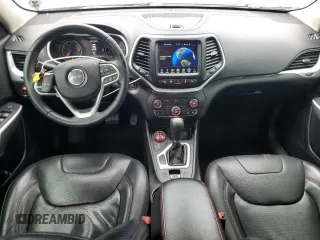 2018 Jeep Cherokee Trailhawk with VIN 1C4PJMBB0JD500672, listed as a Copart auction lot 63207915 with 72,954 mi miles and Salvage title. Bid and sale history available at DreamBid. Image 8.