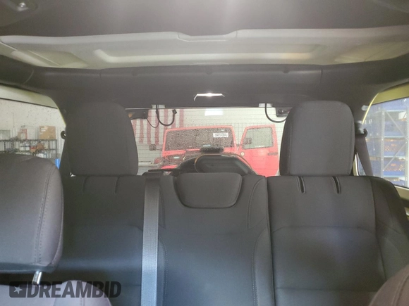 2023 Jeep Wrangler Willys with VIN 1C4HJXDN9PW640617, listed as a Copart auction lot 84894564 with 2,136 mi miles and Salvage Title. Bid and sale history available at DreamBid. Image 10.
