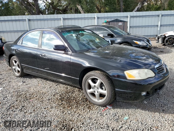 2002 Mazda Millenia z VIN JM1TA221421729790, wystawiony jako Copart lot #84460794 z przebiegiem 68 102 mil mil oraz Szkoda całkowita • Salvage title. Historia ofert i sprzedaży dostępna na DreamBid. Obrazek 4.