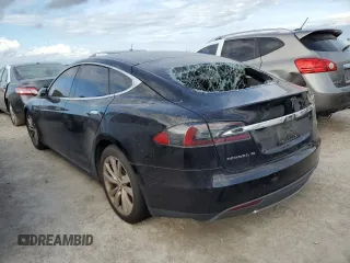 2016 Tesla Model S 90D с VIN 5YJSA1E27GF125739, выставлен на аукционе Copart как лот 75074624 с пробегом Не указан миль и Списание • Salvage title. История ставок и продаж доступна на DreamBid. Изображение 2.