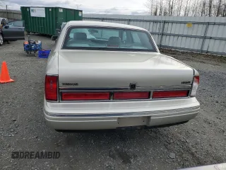 1997 Lincoln Town Car Executive z VIN 1LNLM81W9VY643745, wystawiony jako Copart lot #47921365 z przebiegiem 68 821 mil mil oraz Szkoda całkowita • Salvage title. Historia ofert i sprzedaży dostępna na DreamBid. Obrazek 6.