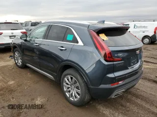2020 Cadillac XT4 FWD Premium Luxury z VIN 1GYFZCR43LF050118, wystawiony jako Copart lot #49529635 z przebiegiem 93 290 mil mil oraz Tytuł czysty. Historia ofert i sprzedaży dostępna na DreamBid. Obrazek 2.