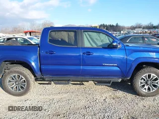 2023 Toyota Tacoma 4WD SR with VIN 3TYCZ5AN1PT119133, listed as a IAAI auction lot 41574906 with 19,887 mi miles. Bid and sale history available at carsss.com. Image 12.