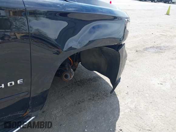 2015 Chevrolet Tahoe LTZ with VIN 1GNSKCKC8FR514671, listed as a IAAI auction lot 42157084 with 182,665 mi miles and . Bid and sale history available at DreamBid. Image 17.