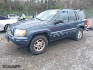 2004 Jeep Grand Cherokee Laredo with VIN 1J4GW48S94C343365, listed as a IAAI auction lot 41917596 with 170,957 mi miles. Bid and sale history available at carsss.com. Image 2.