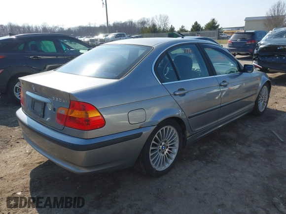 2003 BMW 3 Series 330xi with VIN WBAEW534X3PN31070, listed as a IAAI auction lot 41776406 with 176,383 mi miles. Bid and sale history available at carsss.com. Image 4.