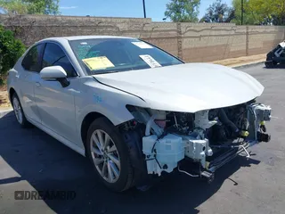 2023 Toyota Camry LE z VIN 4T1R11AK2PU137062, wystawiony jako IAAI lot #42280599 z przebiegiem 16 892 mil mil oraz . Historia ofert i sprzedaży dostępna na DreamBid. Obrazek 1.