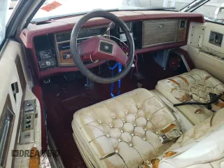 1983 Cadillac Eldorado z VIN 1G6AL5787DE628931, wystawiony jako Copart lot #73113774 z przebiegiem 28 559 mil mil oraz Tytuł czysty. Historia ofert i sprzedaży dostępna na DreamBid. Obrazek 8.