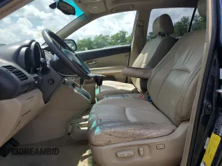 2006 Lexus RX 400h with VIN JTJHW31U360011844, listed as a Copart auction lot 64937715 with 299,187 mi miles and Clean title. Bid and sale history available at DreamBid. Image 7.