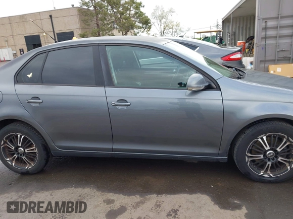 2009 Volkswagen Jetta S with VIN 3VWJZ71K49M053603, listed as a IAAI auction lot 41785816 with 100,065 mi miles and . Bid and sale history available at DreamBid. Image 13.