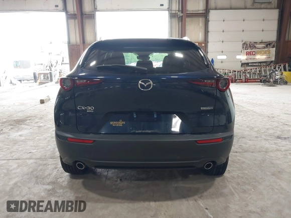 2024 Mazda CX-30 S Select Sport z VIN 3MVDMBBM2RM707143, wystawiony jako IAAI lot #42267284 z przebiegiem 6 133 mil mil oraz . Historia ofert i sprzedaży dostępna na DreamBid. Obrazek 16.