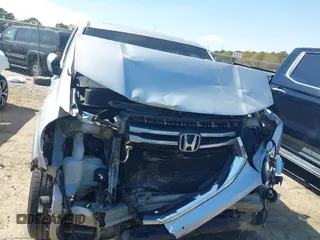 2013 Honda Pilot EX-L with VIN 5FNYF3H59DB022797, listed as a IAAI auction lot 41880675 with 206,359 mi miles and . Bid and sale history available at DreamBid. Image 12.
