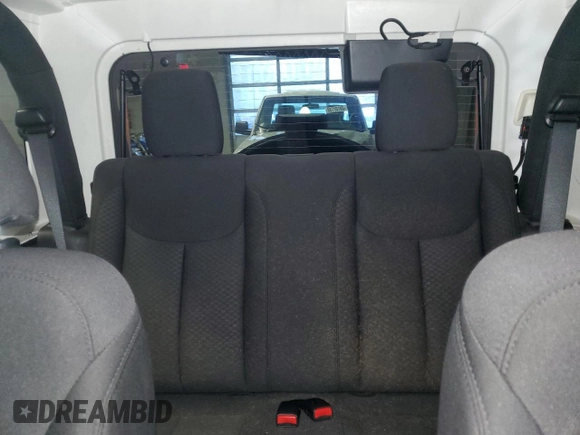 2017 Jeep Wrangler Willys Wheeler with VIN 1C4AJWAG3HL751703, listed as a Copart auction lot 88861635 with 14,114 mi miles and Salvage Title. Bid and sale history available at DreamBid. Image 10.