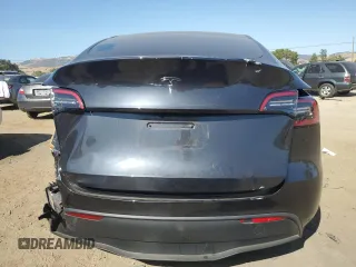 2024 Tesla Model Y with VIN 7SAYGDED0RF125308, listed as a Copart auction lot 61614675 with 11,608 mi miles and Salvage title. Bid and sale history available at DreamBid. Image 6.