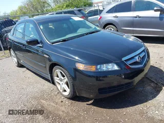 2005 Acura TL with VIN 19UUA66215A075450, listed as a IAAI auction lot 42023790 with 197,045 mi miles. Bid and sale history available at carsss.com. Image 1.